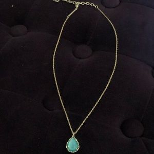 Kendra Scott gold teardrop necklace with beautiful turquoise color stone